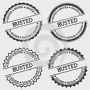 Busted insignia stamp isolated on white.