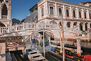 Bustling Grand Canal in Venice, Italy with Gondolas Floating on Water - Tourist Destination View