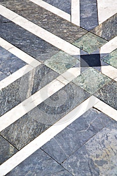 busto arsizio street abstract pavement of a curch ymarble photo