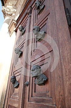 Busts on the door of Mariacki door photo
