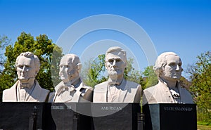 Busts of four statesmen carved statues on Houston