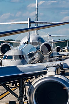 Busy airport tarmac traffic before airplanes take off