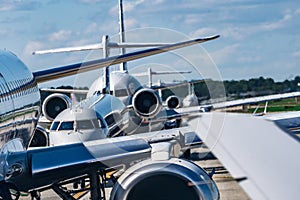 Busy airport tarmac traffic before airplanes take off