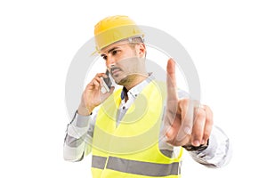 Busy architect or contractor showing wait hold gesture