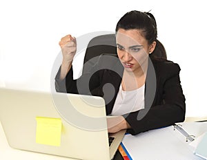 Busy attractive woman in business suit working in stress desperate overwhelmed