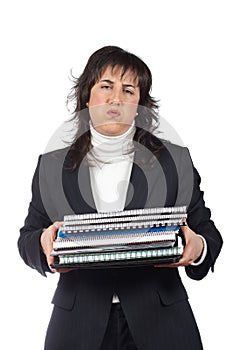 Busy business woman carrying stacked files