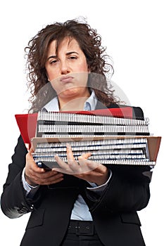 Busy business woman carrying stacked files