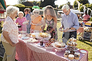 Busy Cake Stall At Summer Garden Fete