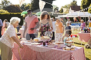 Busy Cake Stall At Summer Garden Fete photo