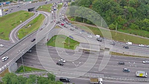 Busy city road junction, heavy traffic jam, rush hour aerial