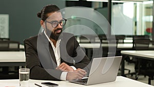 Busy concentrated Indian male employer company corporate Arabian entrepreneur boss CEO business man Muslim businessman