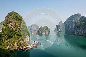 Busy cove near Sung Sot Cave in Halong Bay photo