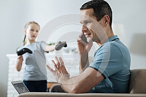 Busy dad having no time on playing with daughter