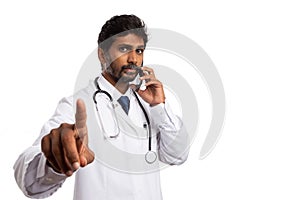 Busy doctor talking on phone