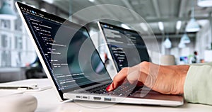 Busy Female Programmer Creating Software Code On Computer
