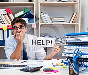 Busy frustrated businessman angry in the office