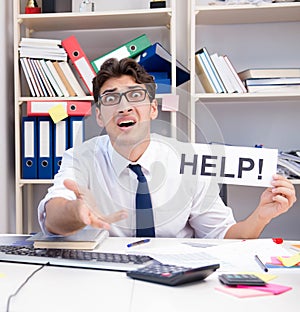 Busy frustrated businessman angry in the office