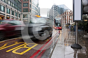Busy london traffic in the pouring rain