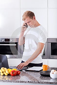 Busy man using computer