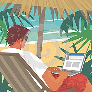 Busy man working on laptop on tropical beach