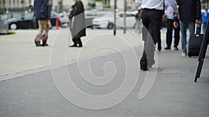 Busy men and women walking to airport with baggage, people traveling, trip