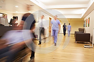 Busy Nurse's Station In Modern Hospital