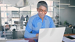 Busy professional business woman executive working on computer in office.