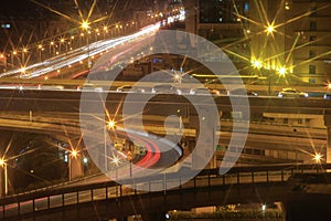 The busy road interchanges at night photo