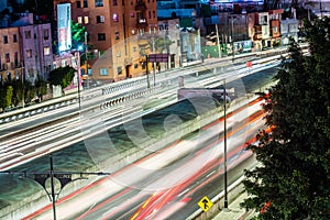 Busy road at night in Mexico City photo