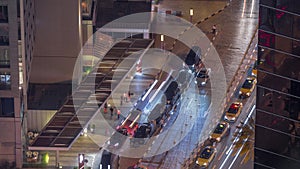 Busy Sheikh Zayed Road traffic aerial night timelapse in Dubai city, United Arab Emirates