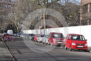 Busy street parked cars