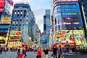 Busy streets of Shinjuku area in Tokyo, Japan in the evening