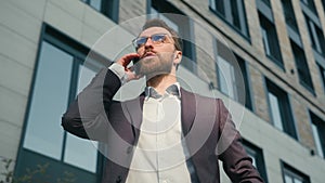 Busy successful adult businessman Caucasian man talking mobile phone smartphone call outside office male entrepreneur