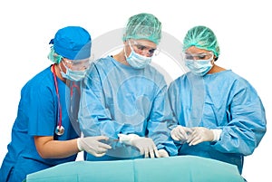 Busy surgeons in operation