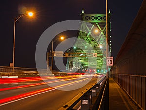 Busy traffic on a bridge, Long exposure with light trail, Montreal, Canada