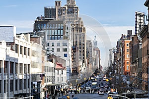 Busy view of 14th Street with crowds of people scene from the Highline Park New York City photo