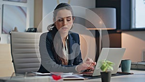 Busy woman study documents creative office closeup. Businesswoman typing laptop