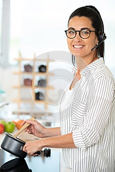 busy woman working in kitchen