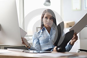 Busy woman at workplace