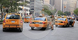 Busy yellow taxis in traffic, New York City