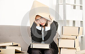 Busy young businesswoman, frustration secretary girl with folder on head working overtime. Secretary accountant woman
