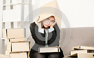 Busy young businesswoman, frustration secretary girl with folder on head working overtime. Secretary accountant woman