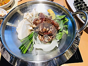 Buta shabu or marinated pork hot pot.