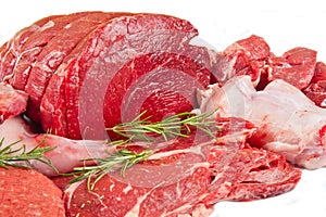 Butcher cut meat assortment garnished