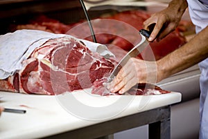 Butcher Cutting Meat