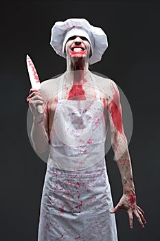 Butcher man. aggressive maniac chef in the blood