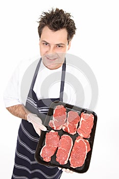 Butcher with tender steak