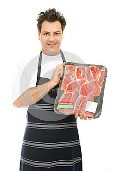 Butcher with tray of steak