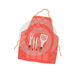 Butchers apron with grilling BBQ tools in pockets. Barbecue accessories and supplies, metal tongs, fork and spatula for