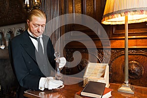 Butler serving a drink